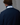 Back view of navy jacket with white inner collar embroidered with Henri Lloyd logo.