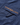 Close-up of the chest pocket on the Men's Aston Crew Jacket showing embroidered Henri-Lloyd logo with water droplets on the fabric.