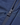 Close-up of the front zip and branded zip pull on the Men's Aston Crew Jacket with snap button fastening visible.