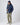 Henri-Lloyd men’s waterproof jacket in navy with hood and pockets.