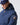 Henri-Lloyd men’s waterproof jacket hood detail with race logo patch.