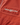 Close-up of chest logo embroidery on jacket fabric.