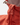Close-up of branded zipper pull and collar seam.