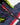 Adjustable hem cord and toggle inside a sailing jacket with black mesh lining and red trim along the lower edge.