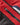 Detail of zipped pocket and pull cord on men's sailing jacket.