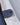 Close-up of internal button fastening in sailing jacket.