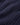 Close up of textured navy cable knit wool fabric.