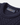 Henri Lloyd woven label on navy wool cable knit sweater.