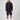 Model wearing Henri-Lloyd Men's Dynamic Jacket in black with black shorts, white socks, and trainers.
