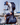 Man stepping on to a sailing boat with a packed weekend bag. 