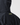 Close-up of back of the Men's Dynamic Jacket in black, highlighting hood vent and Henri-Lloyd branded patch.