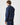 Rear three-quarter view of model wearing a men's sailing smock, showing waistband and reflective detailing on sleeves.