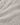 Close up of textured light grey cable knit wool fabric.